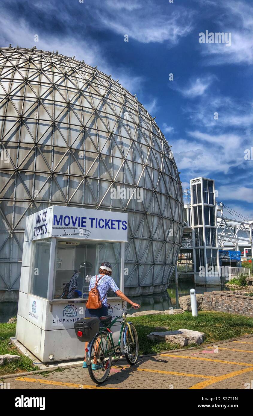 Woman making inquiries at a ticket booth at Ontario Place in Toronto. - Smartphone Captured Stock Image