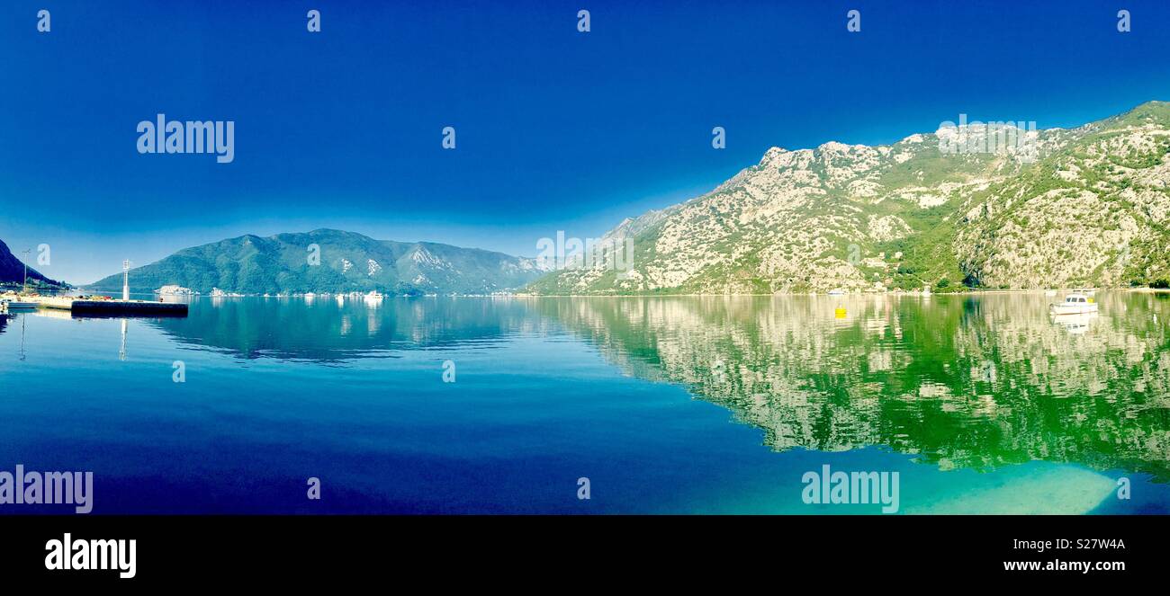 A beautiful reflection at the Bay of Kotor in Montenegro. - Smartphone Captured Stock Image