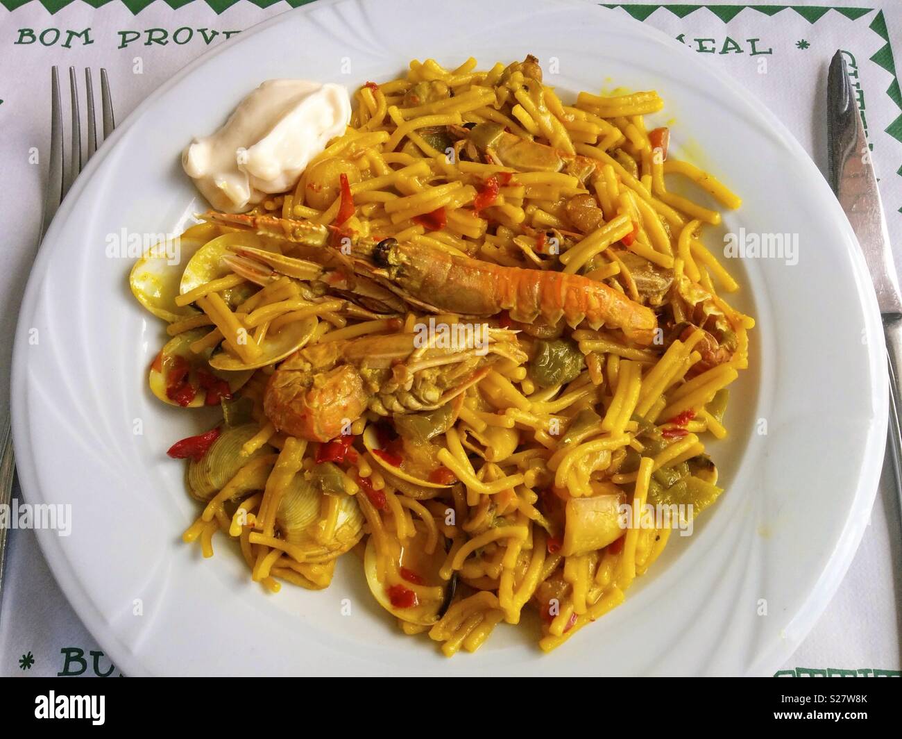 a spanish fideua, a typical noodles casserole with seafood Stock Photo -  Alamy