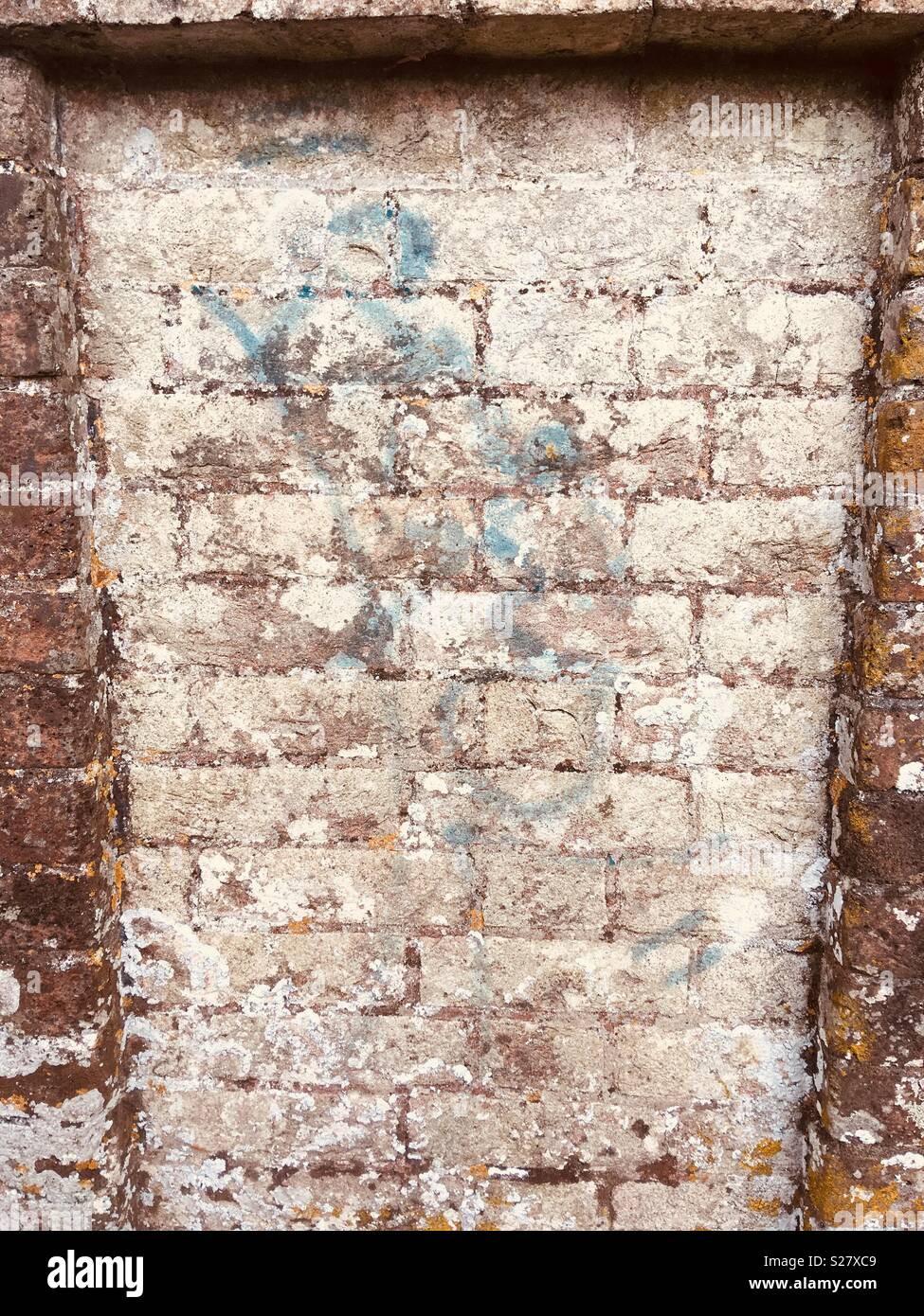 Painted blue marks on a brick wall Stock Photo Alamy