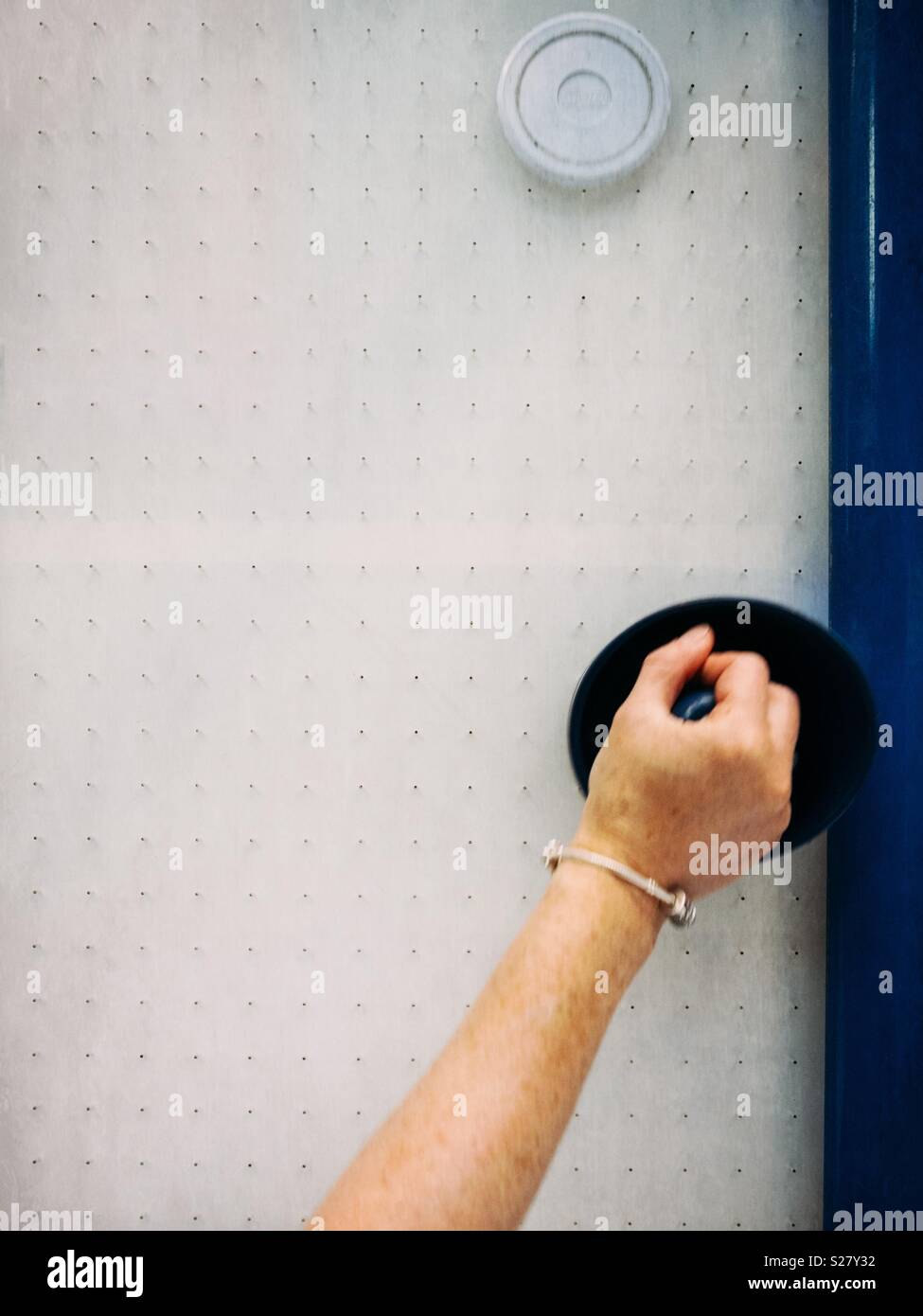 Playing table top ice hockey - Smartphone Captured Stock Image