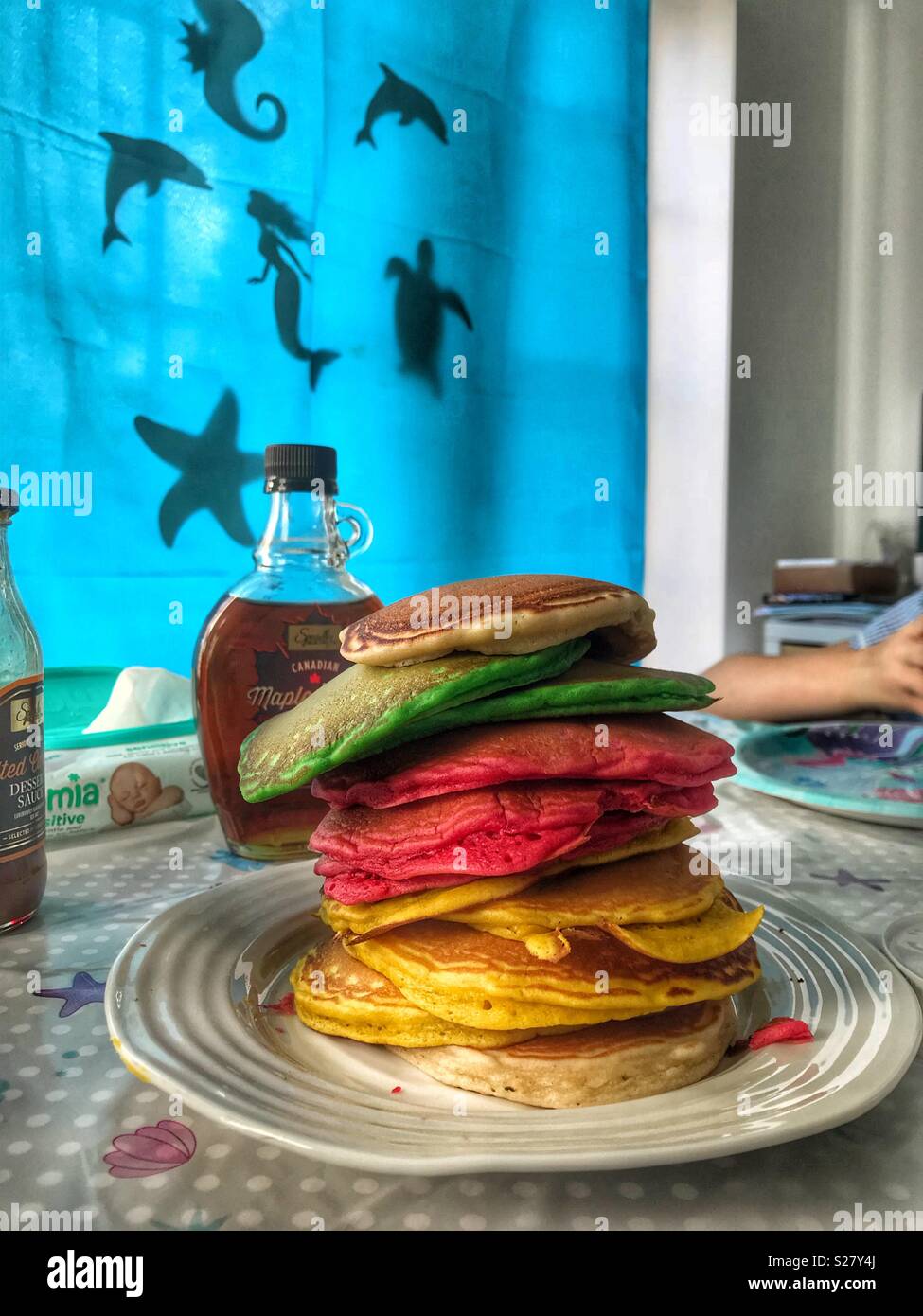 Birthday rainbow American pancakes for a mermaid theme party Stock