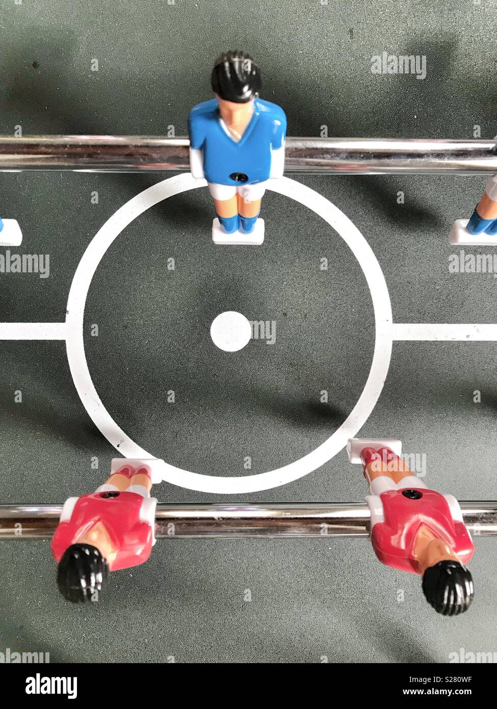 Foosball player on the pitch Stock Photo Alamy