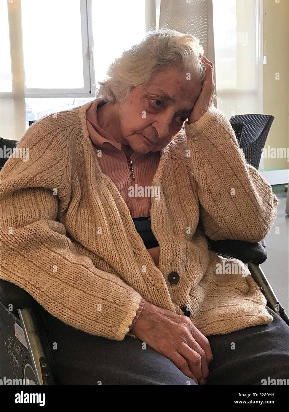 Old lady  thinking, hand on head. - Smartphone Captured Stock Image