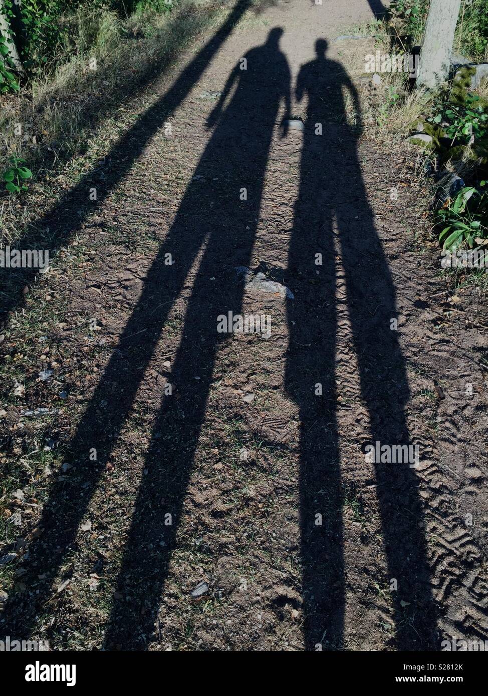 Shadows of two men. - Smartphone Captured Stock Image