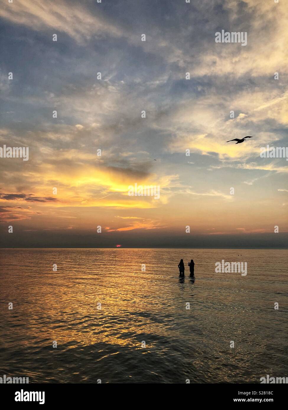 Watching the sun go down in Port Dalhousie, Ontario. - Smartphone Captured Stock Image
