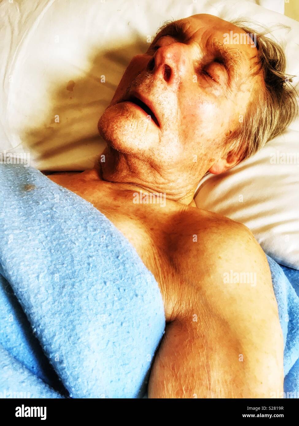 94-year old man asleep - Smartphone Captured Stock Image