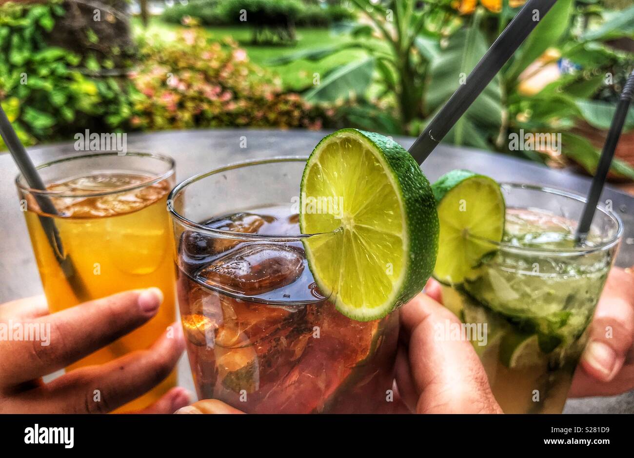 Happy Hour, cocktails, Mojito, rum and coke, poncha, all with ice and a