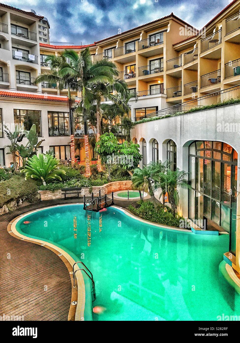 Swimming pool and beautiful garden view in the early evening at Hotel Eden Mar, PortoBay Hotels & Resorts, Funchal, Madeira, Portugal Stock Photo