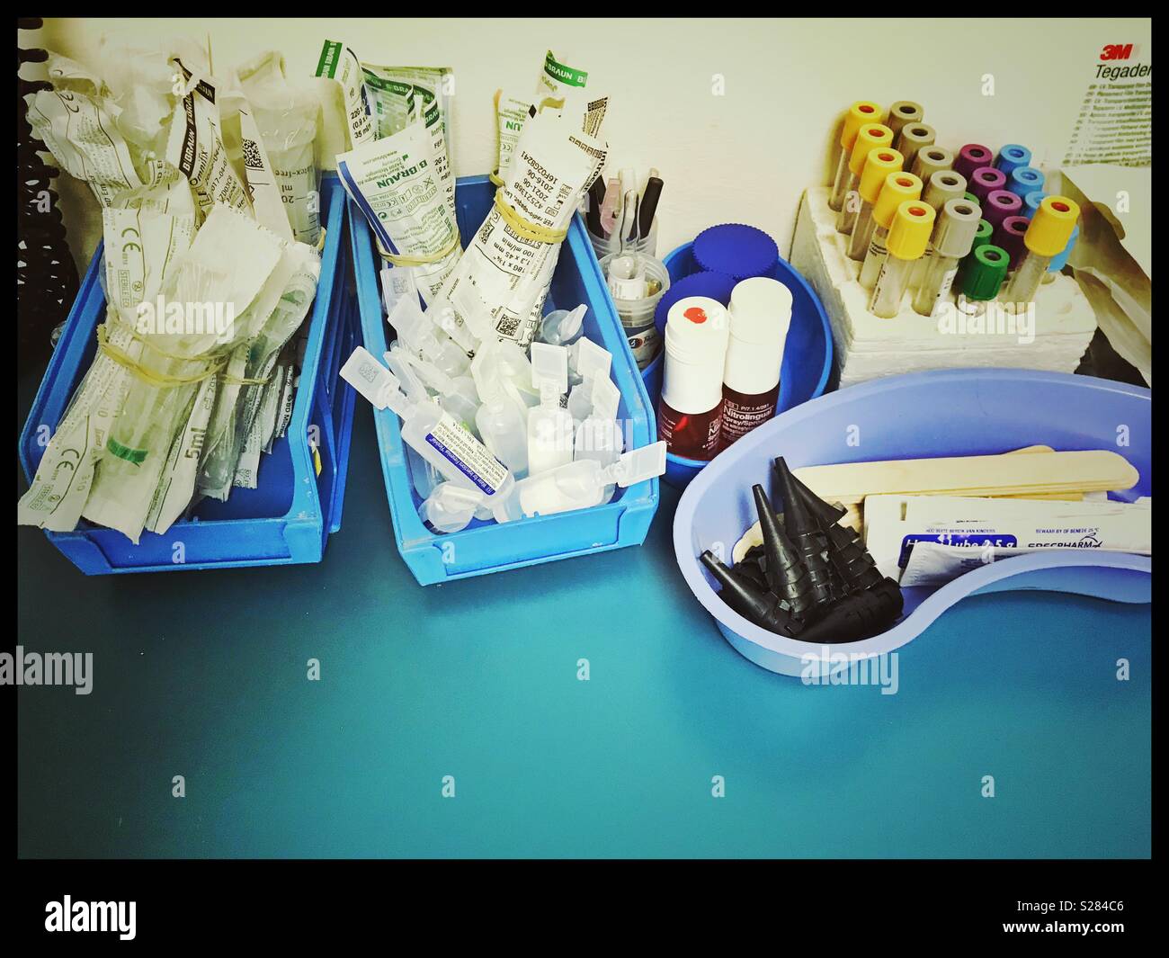 Medical equipment in trays in emergency room in A&E ward of hospital. - Smartphone Captured Stock Image