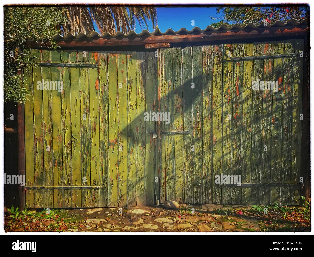 Peeling garage doors, Tulbagh, Western Cape Province, South Africa. - Smartphone Captured Stock Image