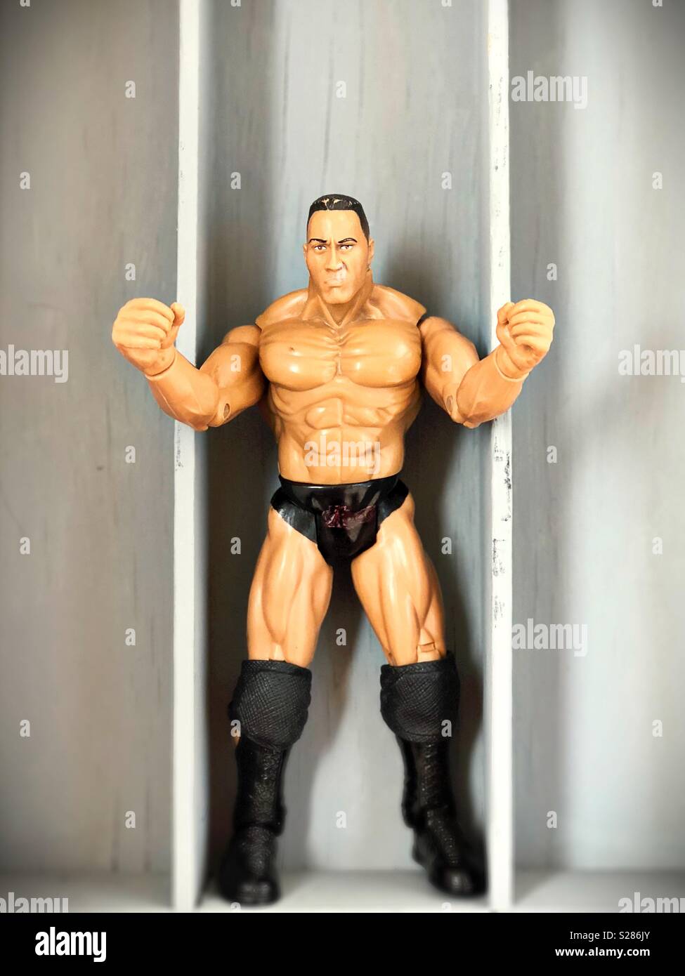 A very muscular action figure. Stock Photo