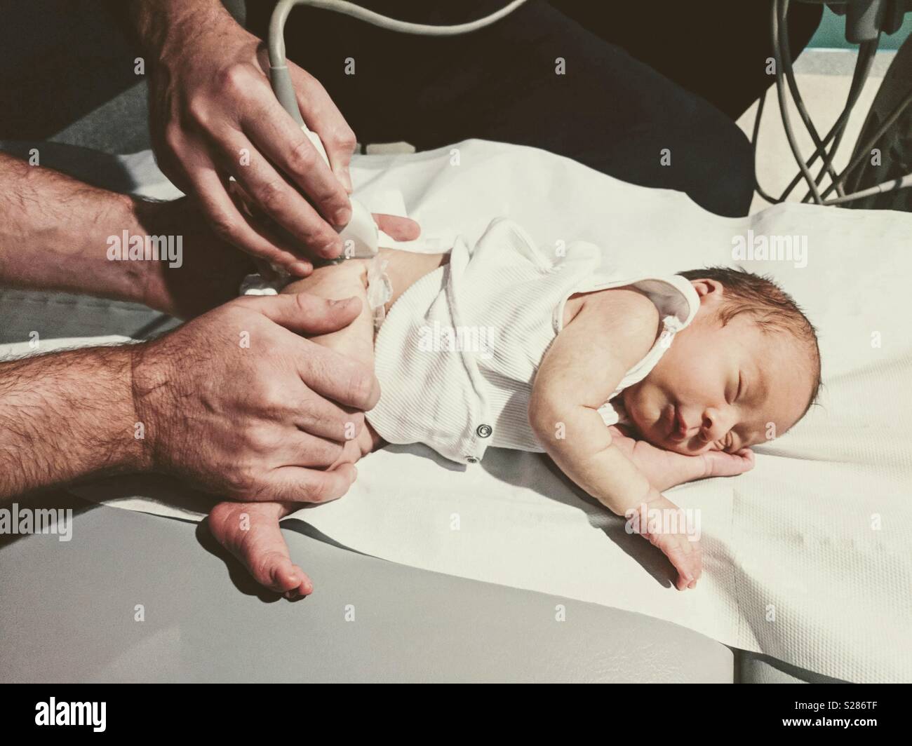 Baby hip ultrasound Stock Photo