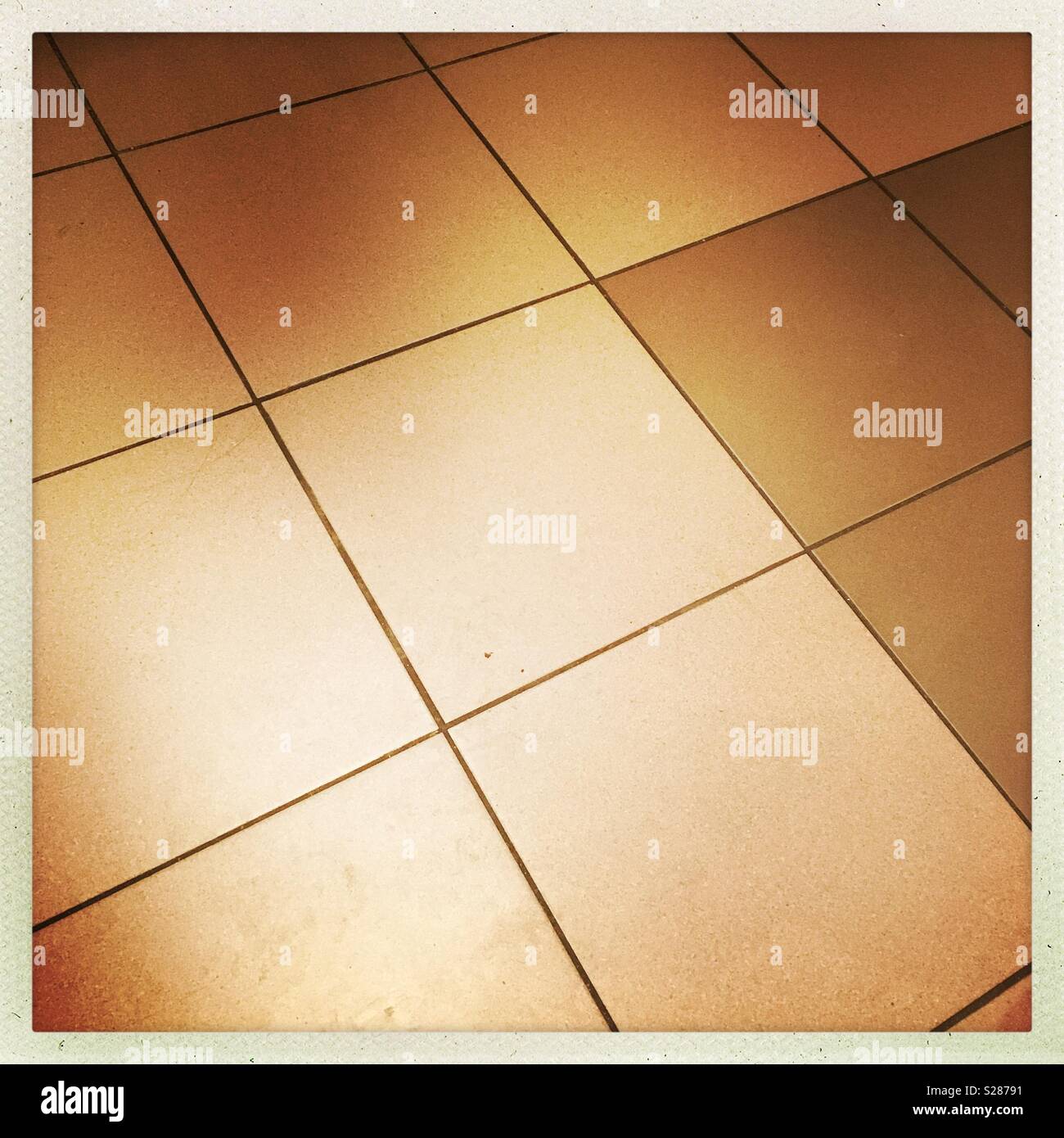 Square tiles on a floor - Smartphone Captured Stock Image