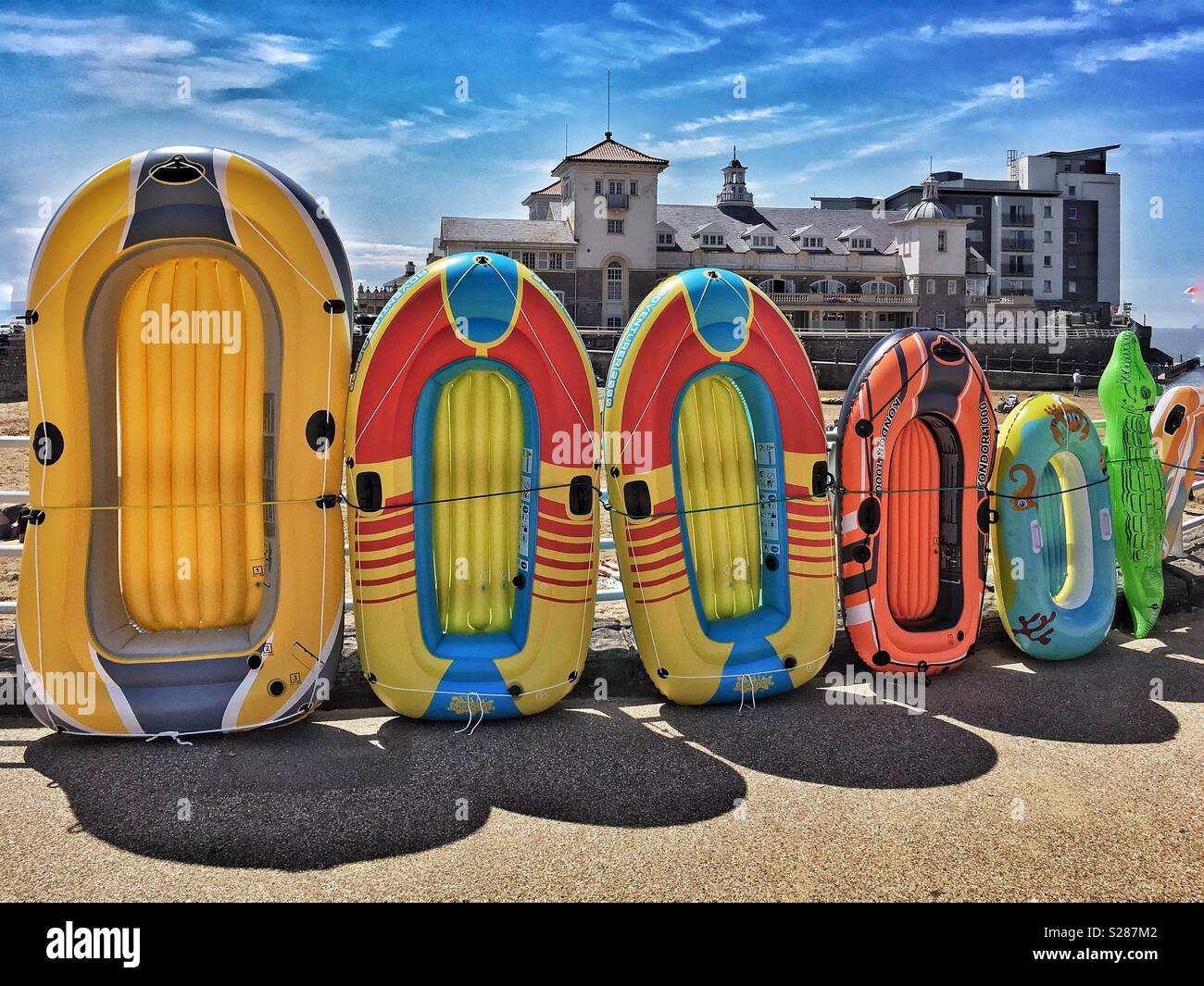 Inflatable dinghies for sale at a stall on the sea front in Weston-super-Mare, UK Stock Photo
