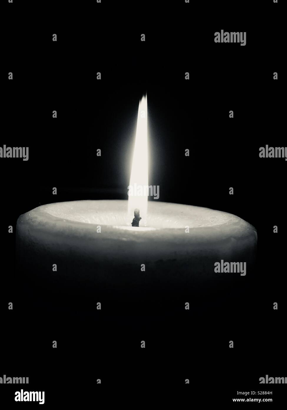 Candle light in black and white Stock Photo - Alamy