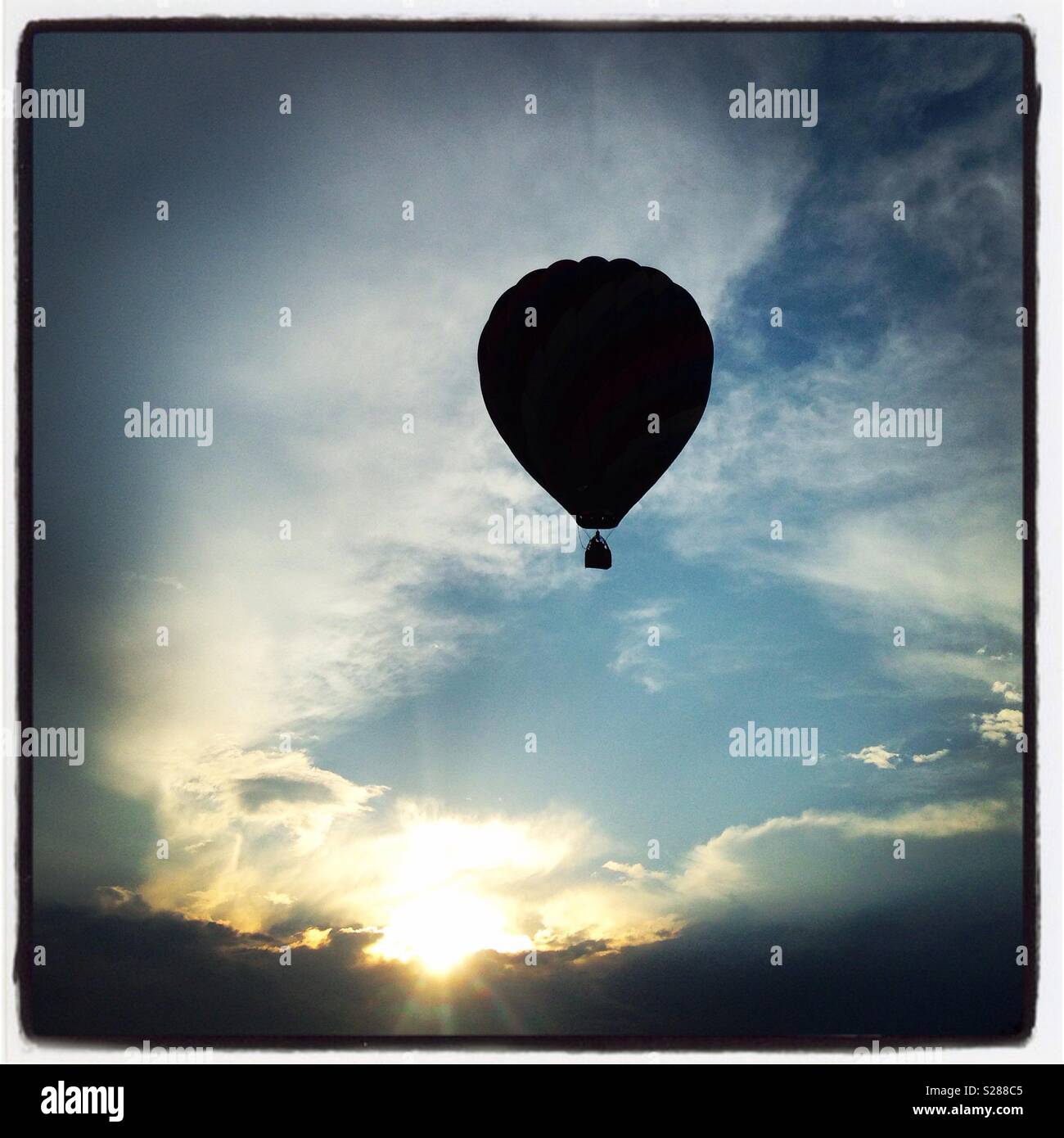Silhouette of hot air balloon in sky - Smartphone Captured Stock Image