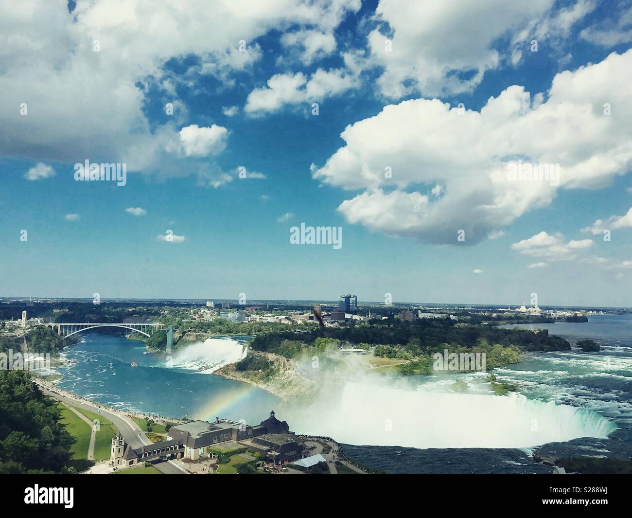Niagara Falls, with a rainbow in the background, on June 28, 2018. - Smartphone Captured Stock Image
