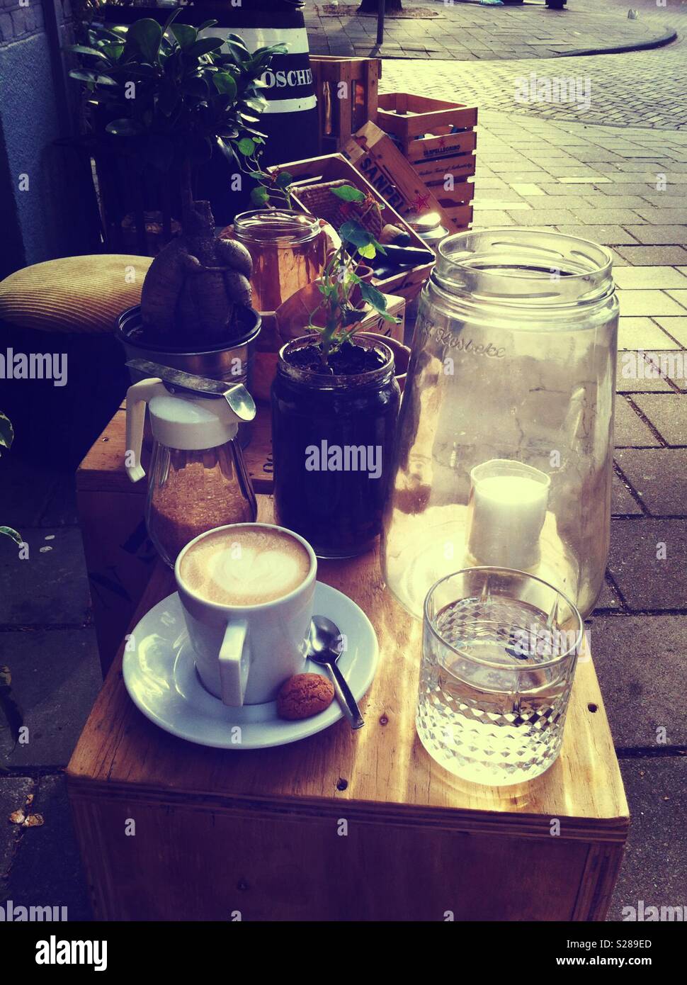 Having a coffee in the middle of the street Stock Photo