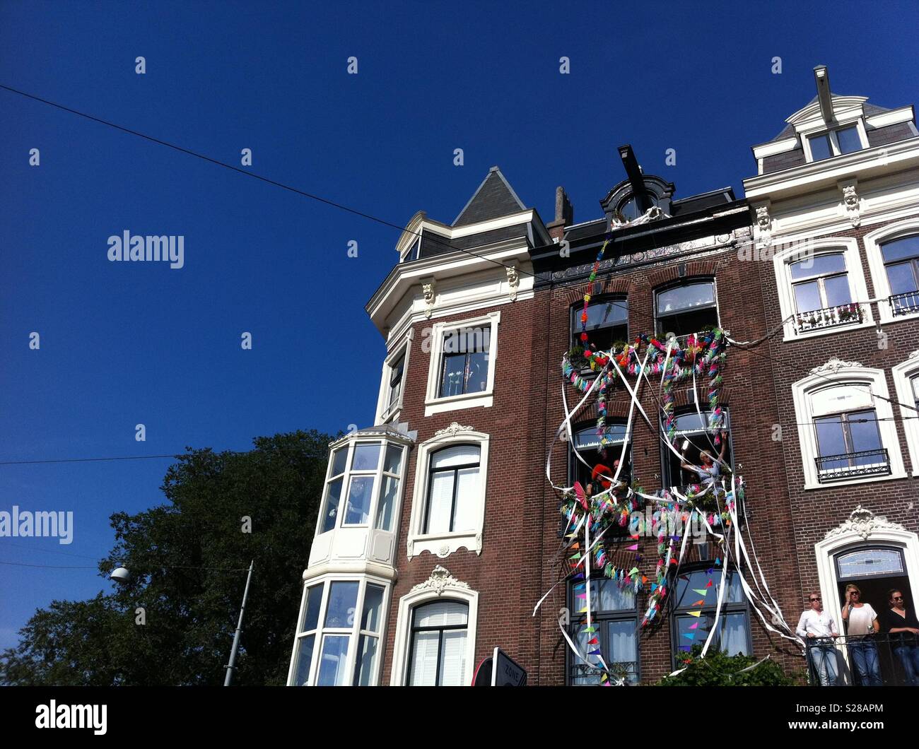 Gay pride party Amsterdam - Dutch building decoration - Smartphone Captured Stock Image