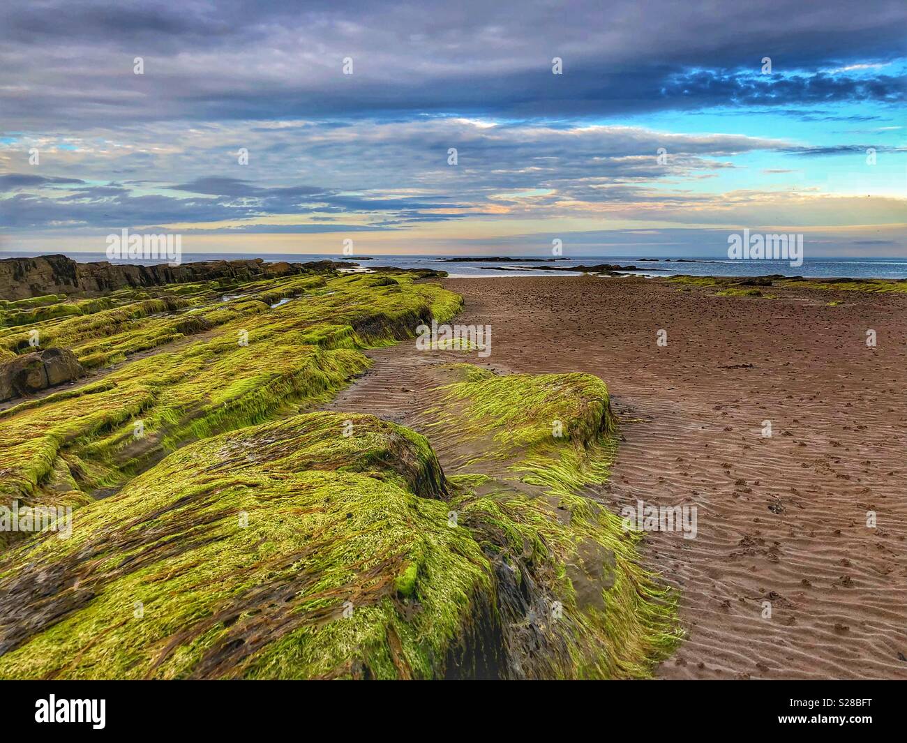 Beautiful seascape revealed at low tide Stock Photo