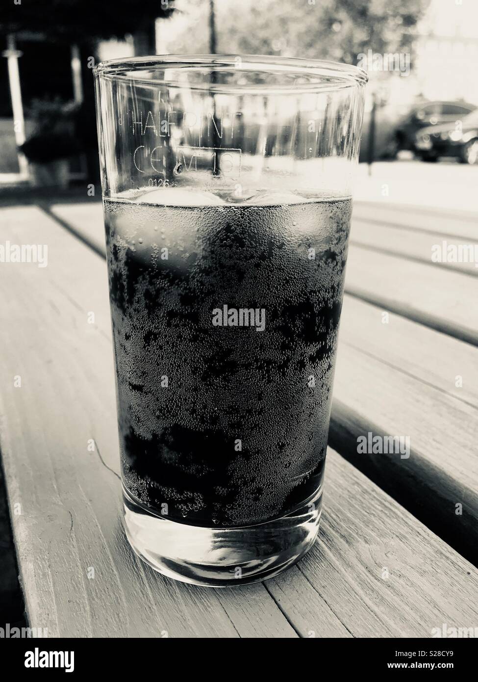 Cool drink with ice on a cafe table outside Stock Photo