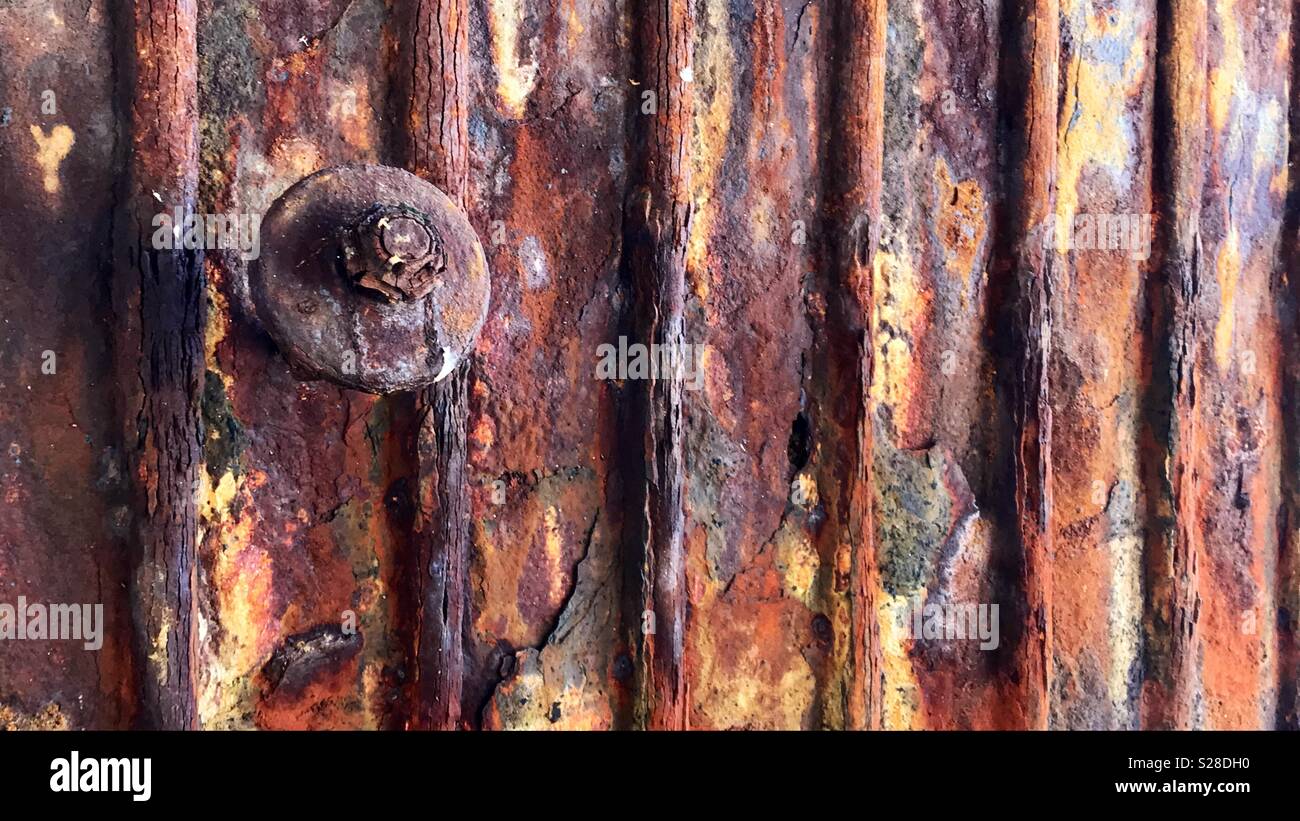 Rusty panel of an old and disassembled oil rig at Bacara beach, GOLETA, California - Smartphone Captured Stock Image