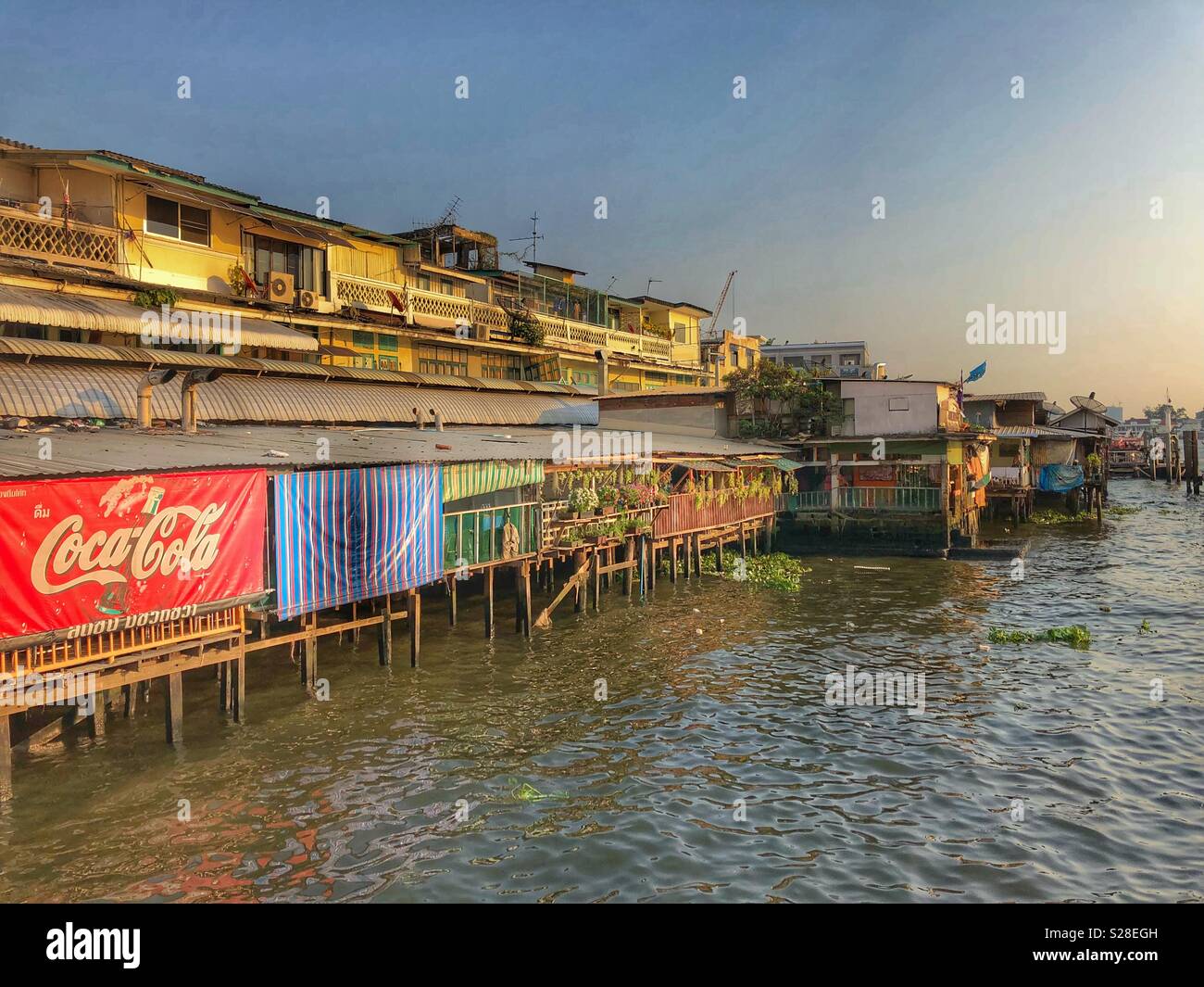 Riverside community in Bangkok, Thailand. - Smartphone Captured Stock Image