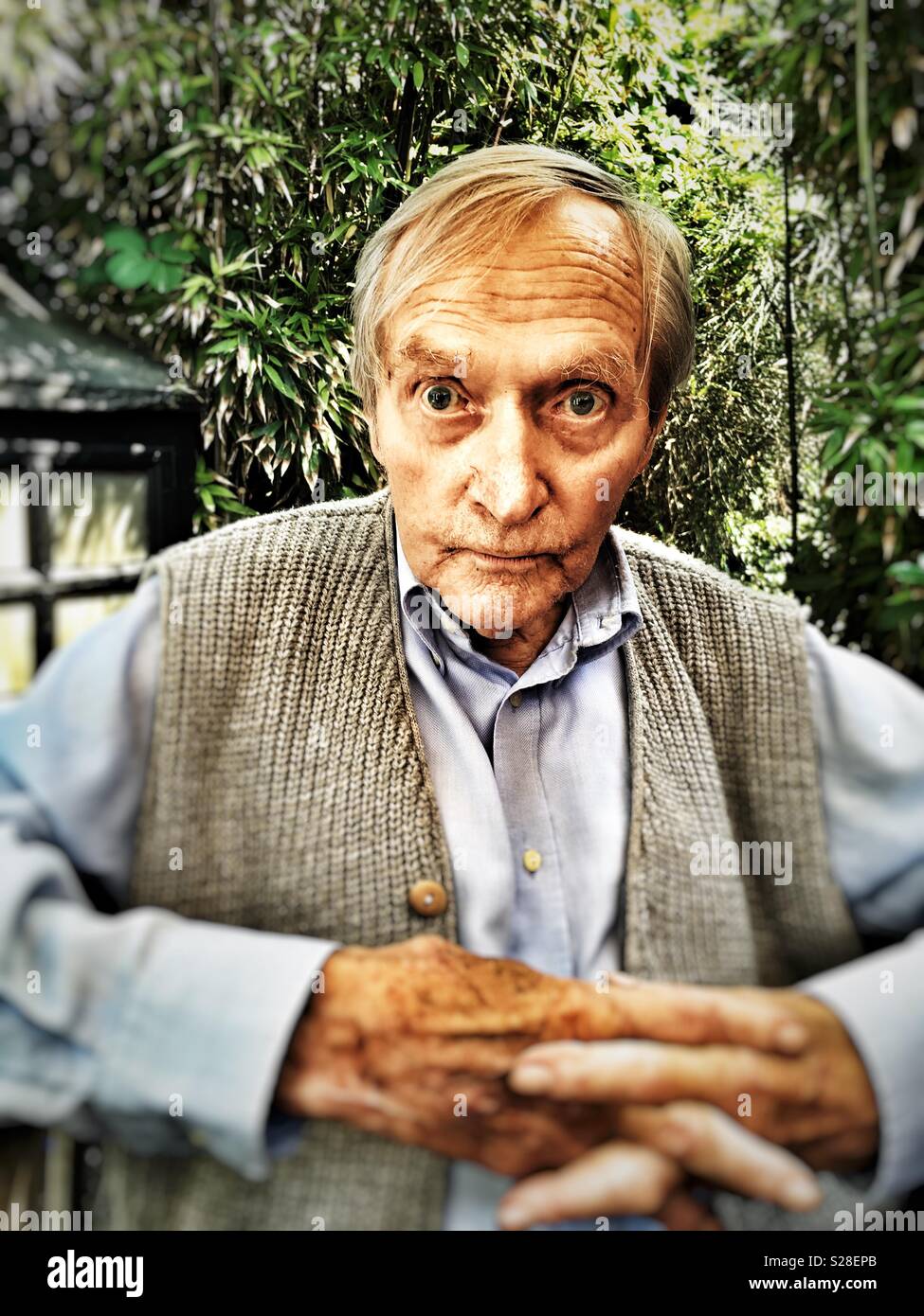 Elderly man in his garden - Smartphone Captured Stock Image