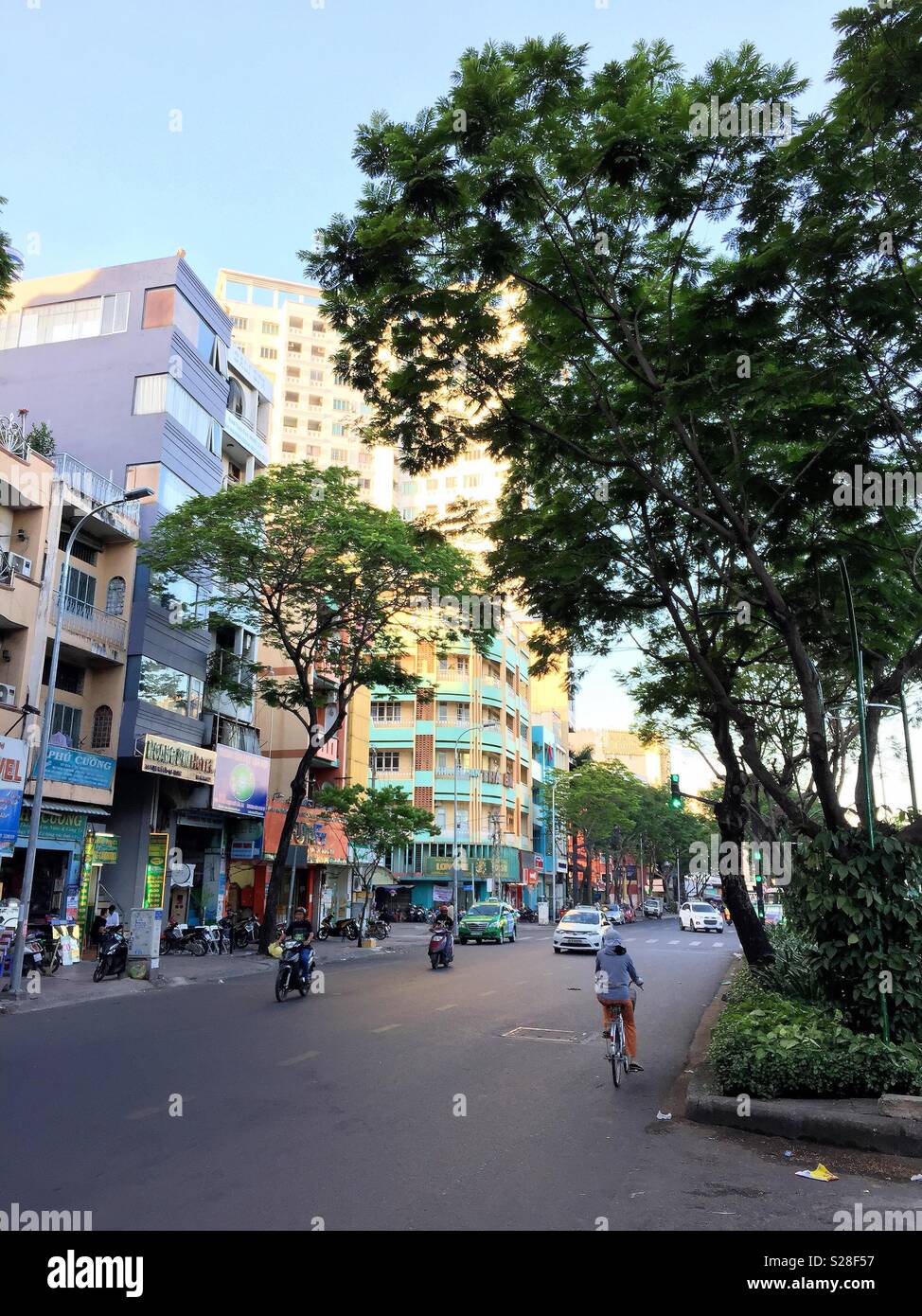 Early street scene in saigon streets. Stock Photo