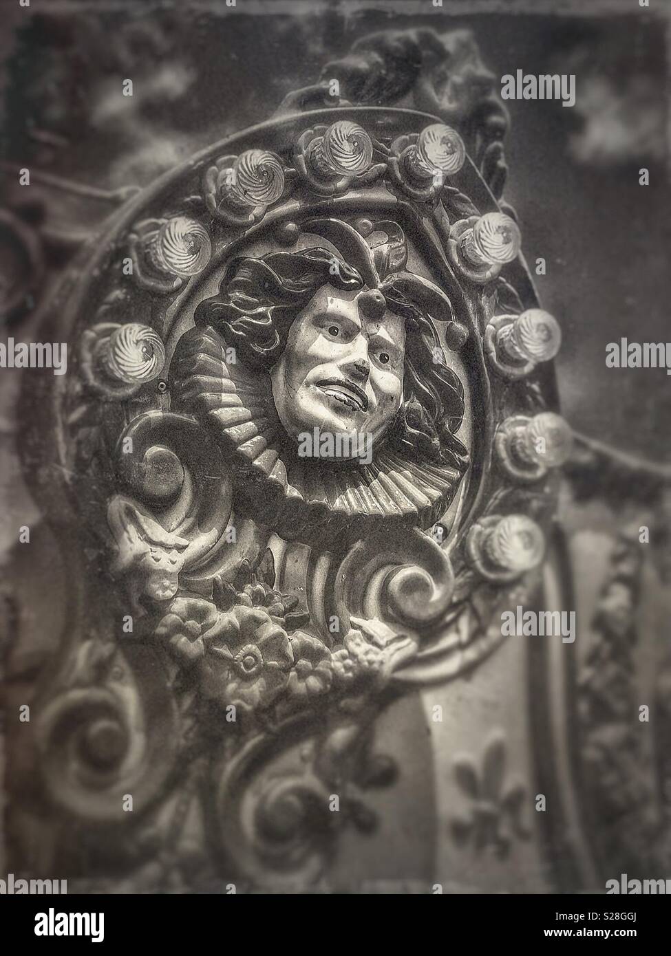 Jester face on carousel ride - Smartphone Captured Stock Image