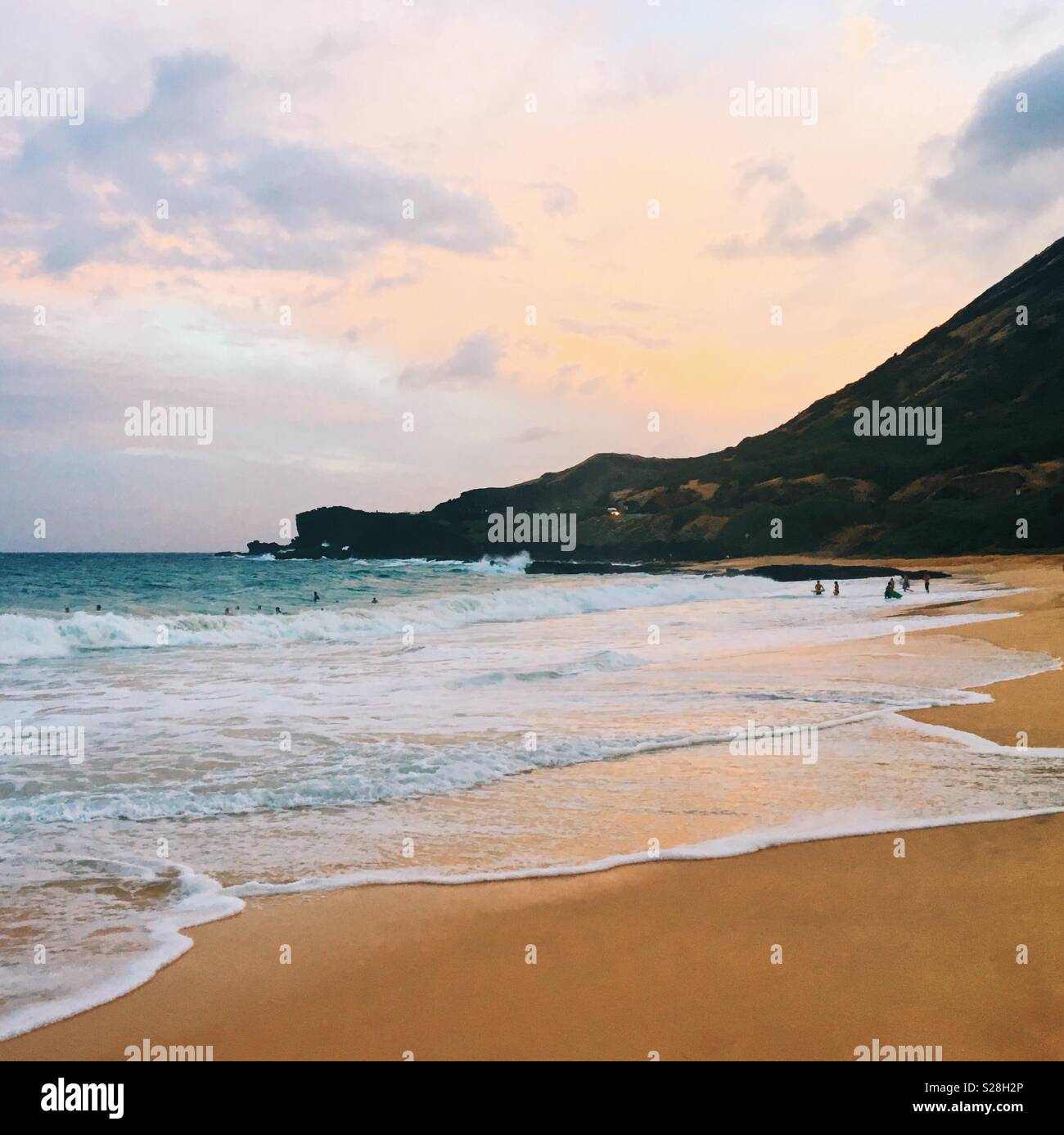 Beach sunset on the east coast of Oahu, Hawaii. Square crop. - Smartphone Captured Stock Image