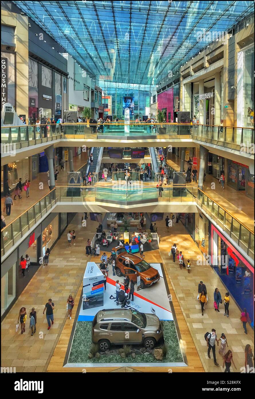 A Colour view of the Bullring Shopping Centre Complex in the City of Birmingham, England, UK. Lots of shops means lots of things to buy. An example of the British High Street & Credit Card Consumerism - Smartphone Captured Stock Image