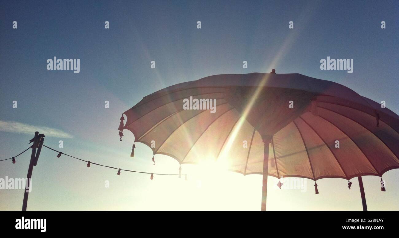 Sunset behind a parasol - Smartphone Captured Stock Image