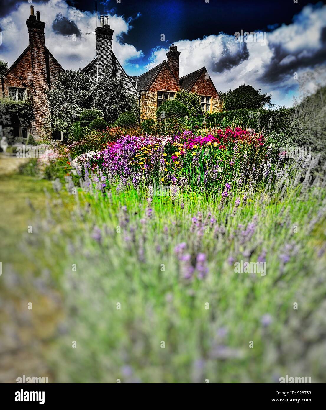 Felley Priory and colourful herbaceous borders, North Nottinghamshire, East Midlands, England. Founded in 1156. - Smartphone Captured Stock Image