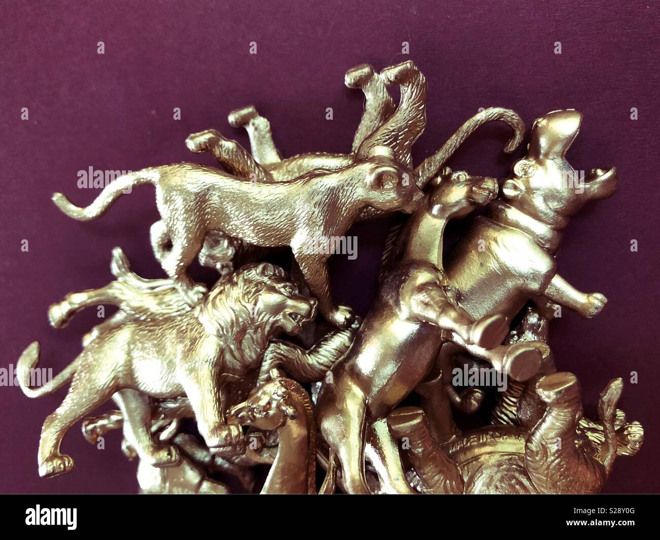 A pile of gold animal figurines Stock Photo - Alamy