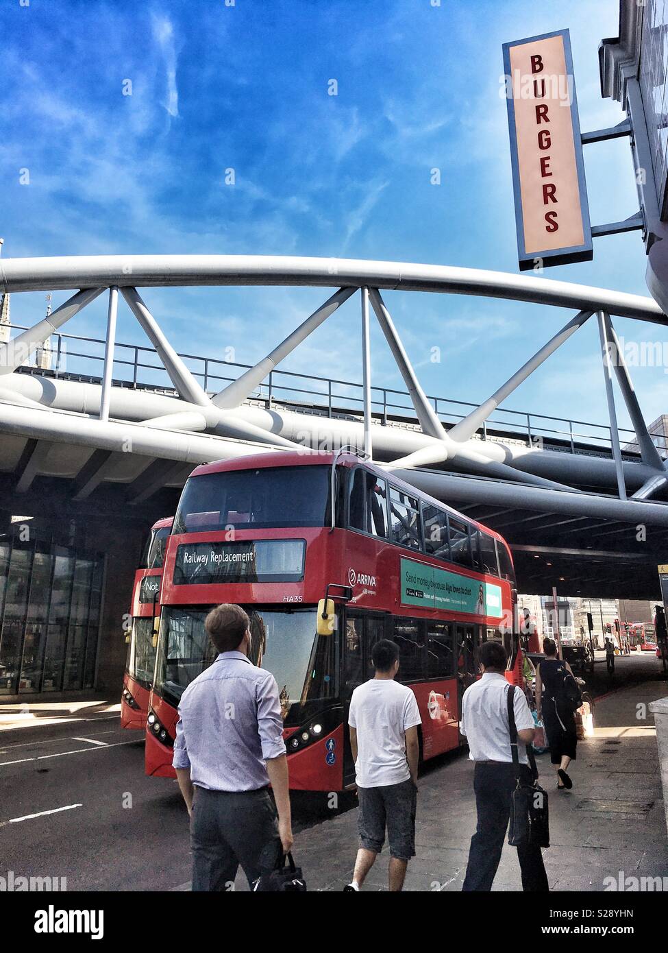 City workers walking up Borough High Street in London, England - Smartphone Captured Stock Image