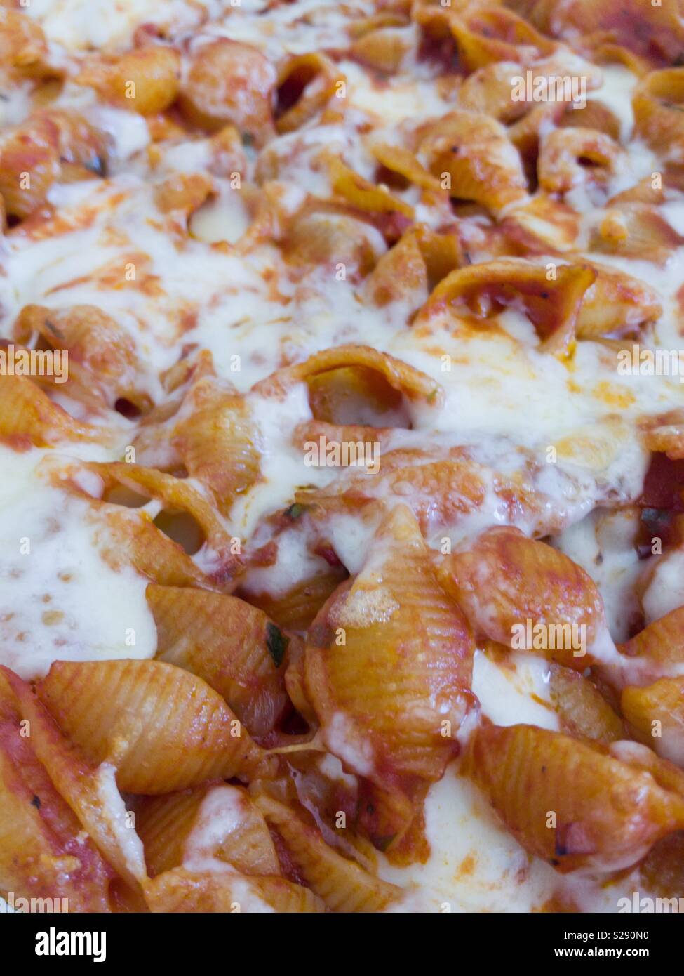 Pasta with tomato sauce and mozzarella cheese Stock Photo