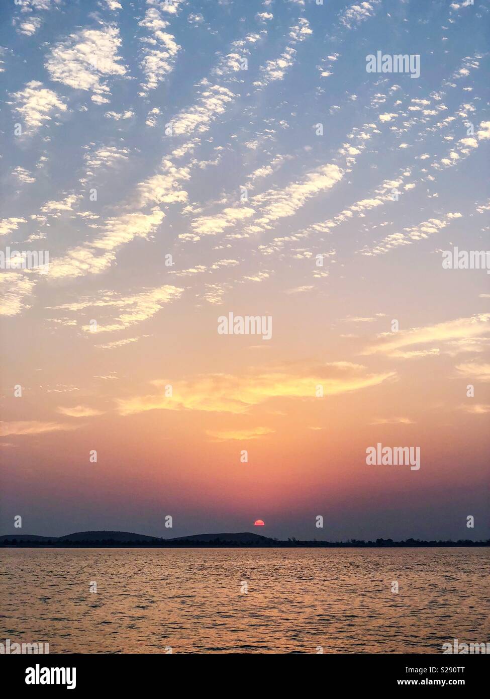 Sunset at Corniche, A peaceful evening in Abu Dhabi, UAE Stock Photo