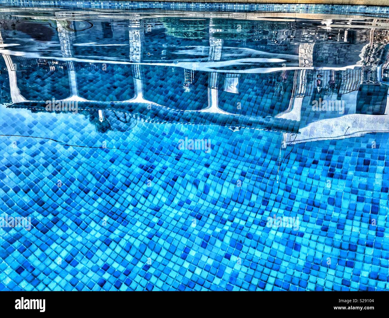 House reflected in swimming pool Stock Photo