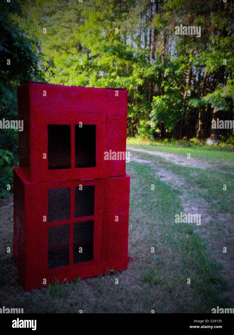 Grainy photo of red telephone kiosk made of TV boxes for Vacation Bible School - Smartphone Captured Stock Image