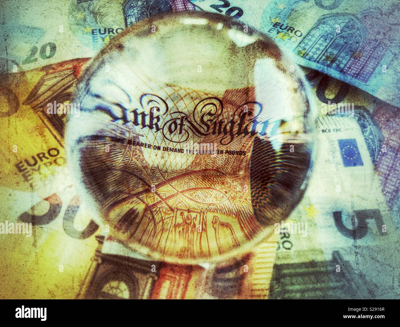 Bank of England on a £10 note in a crystal ball, surrounded by euros. Brexit concept - Smartphone Captured Stock Image
