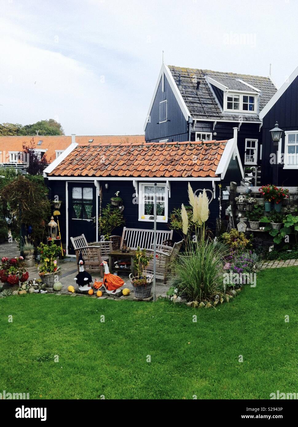 Charmy house with garden Marken island The Netherlands Stock Photo