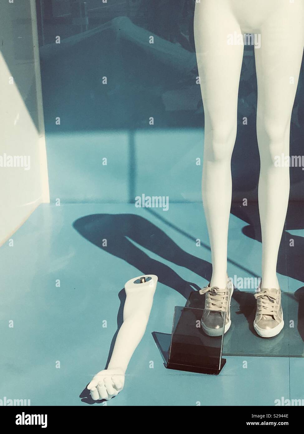 Mannequin legs and arm with shoes on Stock Photo Alamy