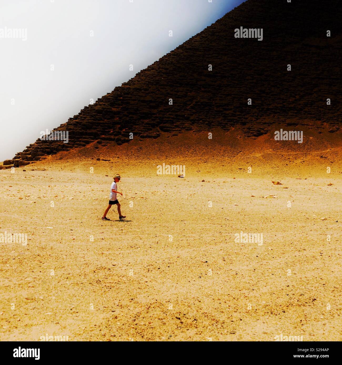 Walking past Red Pyramid - Smartphone Captured Stock Image