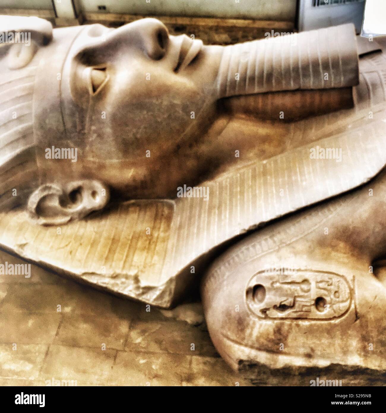 Giant statue of Rameses II in Memphis, Egypt - Smartphone Captured Stock Image