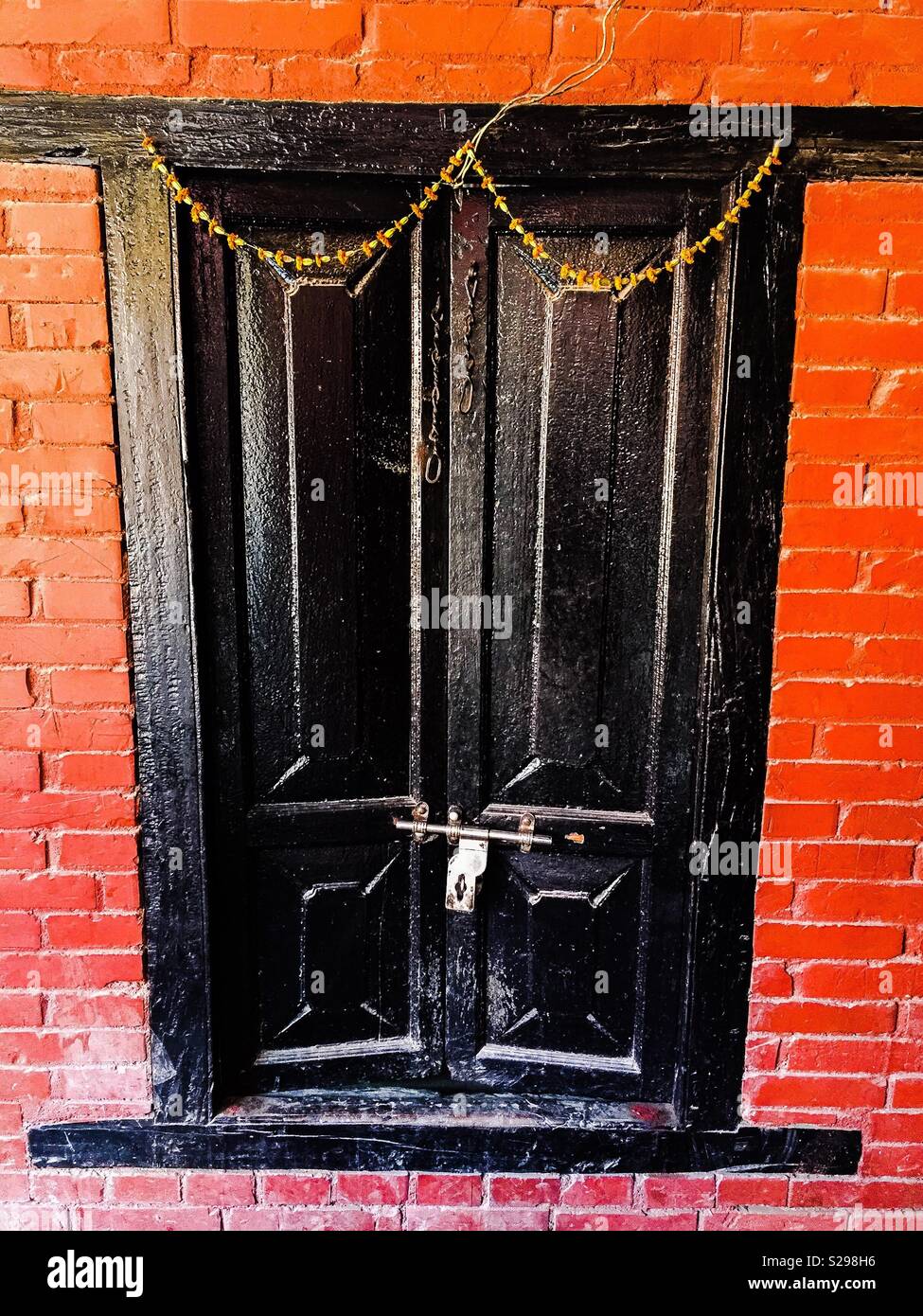 Black painted doorway - Smartphone Captured Stock Image