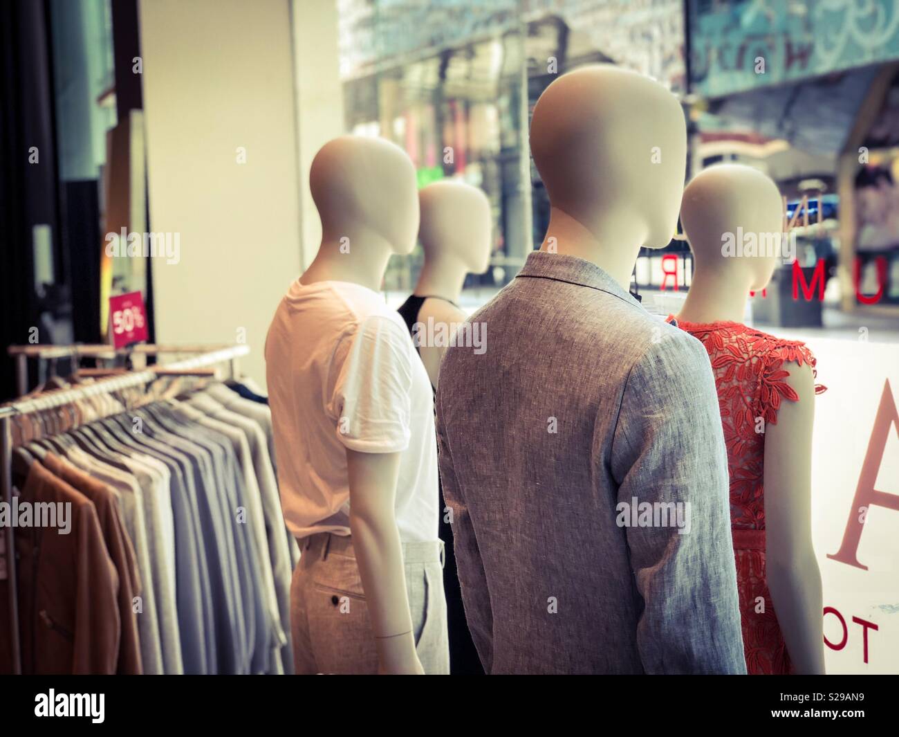 Mannequins on display at a mens retail outlet Stock Photo Alamy