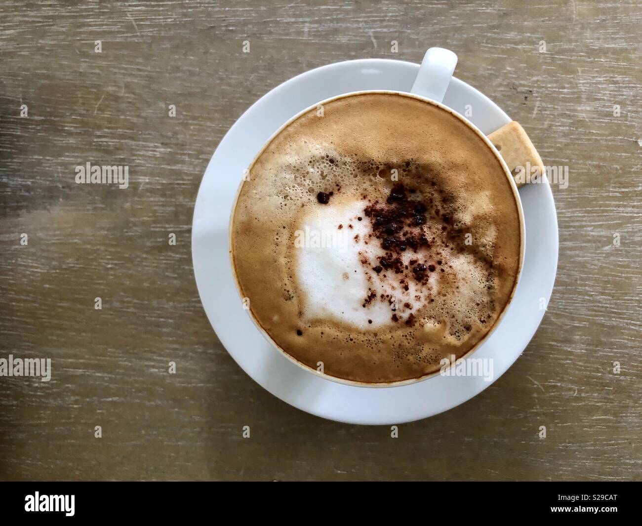 Cappuccino with chocolate sprinkles hi-res stock photography and