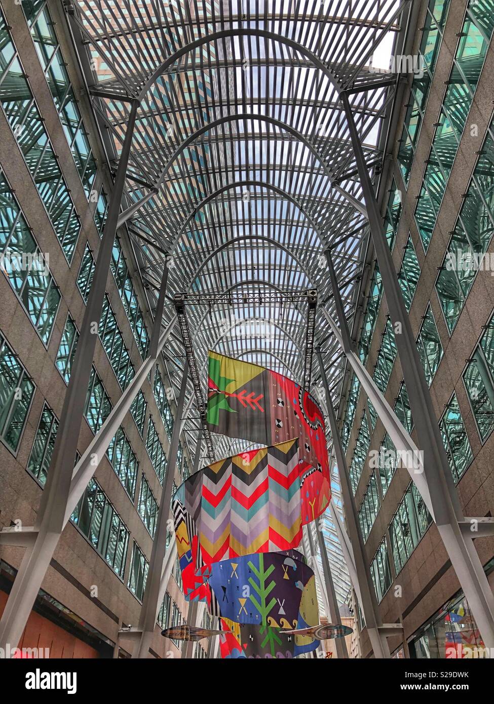 A hanging art installation by Jordan Bennett in the Allen Lambert Galleria, Toronto. Stock Photo